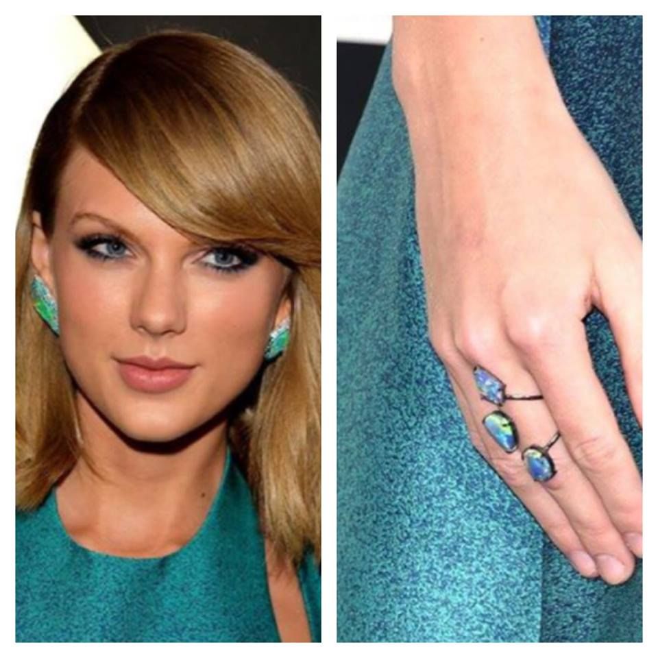Taylor Swift Wearing a opal ring courtesy of https://www.lifeandstylemag.com/.