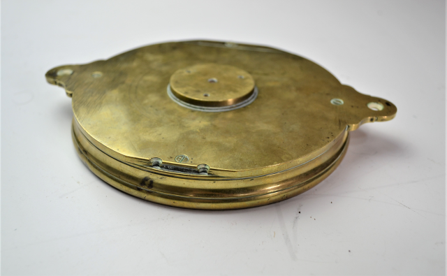 Discover the charm of our late 18th-century brass surveying compass, featuring a rock crystal front! Explore now and connect with history.
