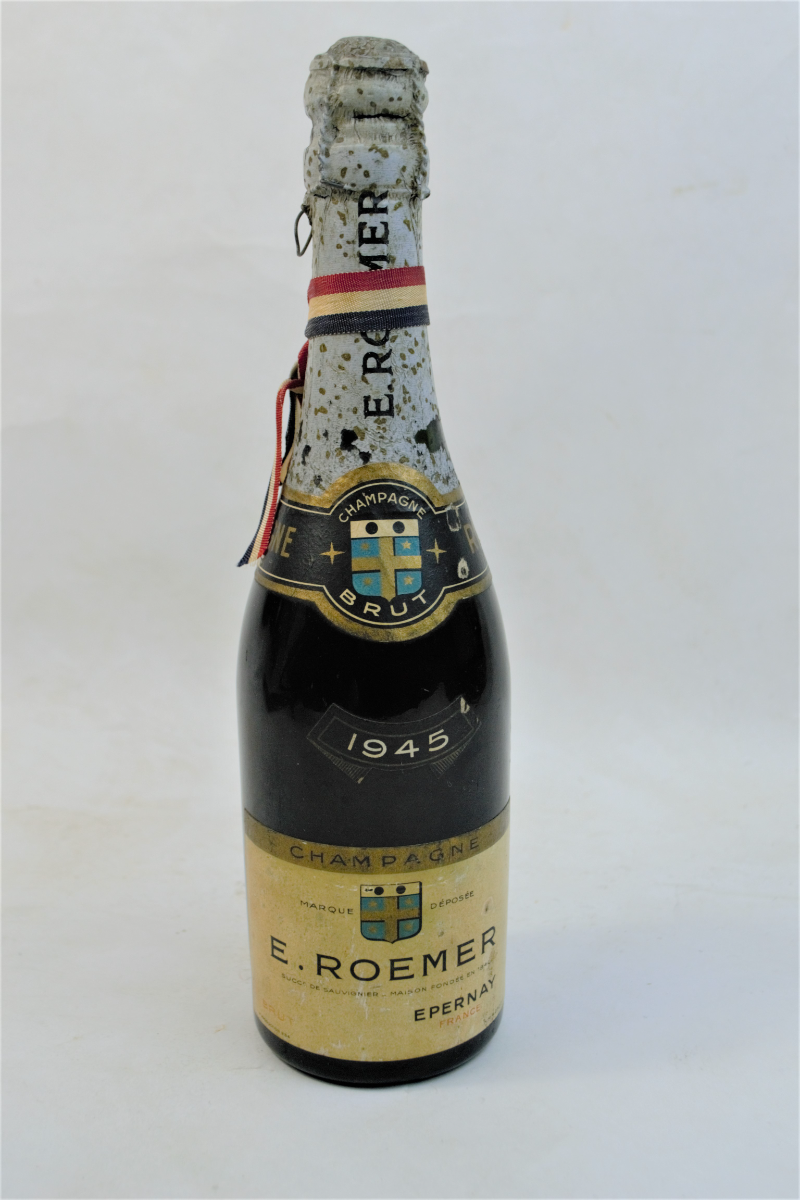 Discover our exclusive E. Roemer Champagne Half Bottle, dated 1945. Celebrate with this unique piece from Epernay, France. Shop now for this unopened, vintage gem!