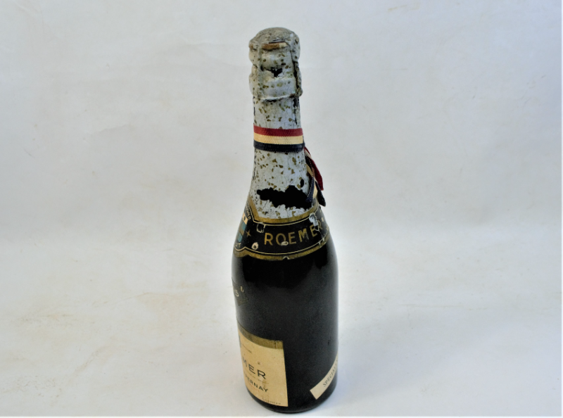 Discover our exclusive E. Roemer Champagne Half Bottle, dated 1945. Celebrate with this unique piece from Epernay, France. Shop now for this unopened, vintage gem!