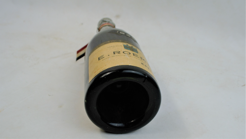 Discover our exclusive E. Roemer Champagne Half Bottle, dated 1945. Celebrate with this unique piece from Epernay, France. Shop now for this unopened, vintage gem!