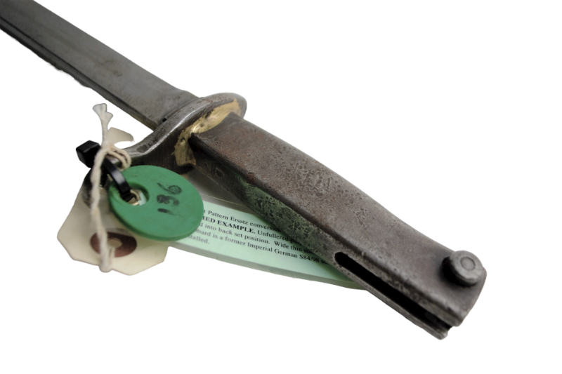 Explore our Turkish Export Pattern Ersatz bayonets, featuring purpose-made, unfullered blades and stamped cross guards. Get your piece, complete with a German S84/98 scabbard, today!