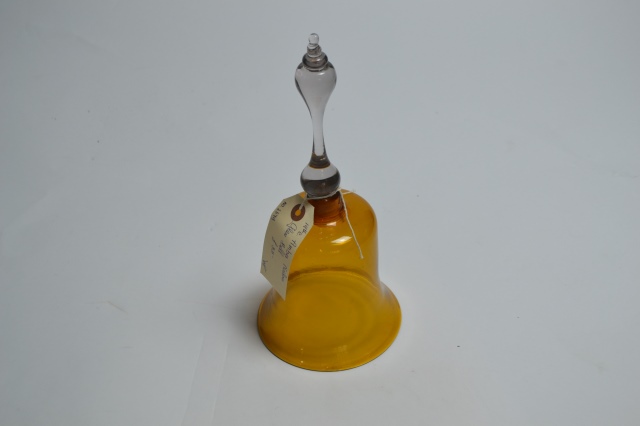 Discover our 19th Century Amber Nailsea Glass Bell, minor defect on rim. Unravel the secret of its vintage charm. Shop now!