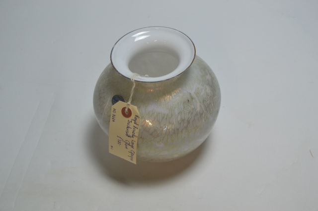 Discover our range of stunning Royal Brierley blue iridescent glass. Standing proudly at 18cm high, it's the perfect piece for any collection. Shop now and transform your space!