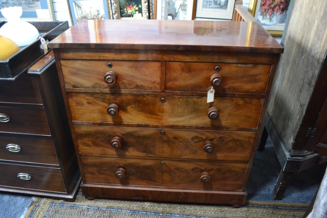 Discover our unique range of 19th-century mahogany chest of drawers, sized 104cm long x 49cm wide x 105 cm high. Shop now for antique elegance!