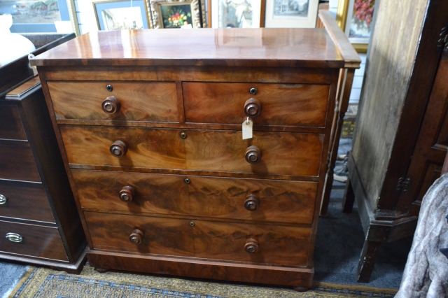 Discover our unique range of 19th-century mahogany chest of drawers, sized 104cm long x 49cm wide x 105 cm high. Shop now for antique elegance!