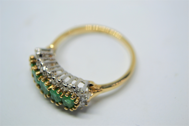 A 9ct Gold Five Emerald and Diamond Ring.