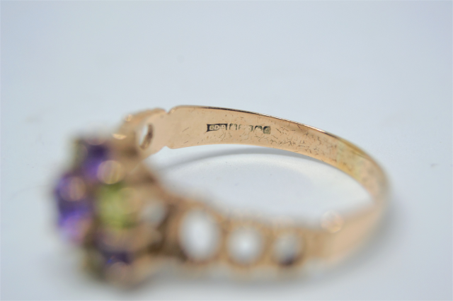 Discover our 9ct Gold Amethyst and Peridot Cluster Ring. Perfectly hallmarked from Birmingham and weighing 3.1g. Ring size U1/2. Shop now for exceptional quality!
