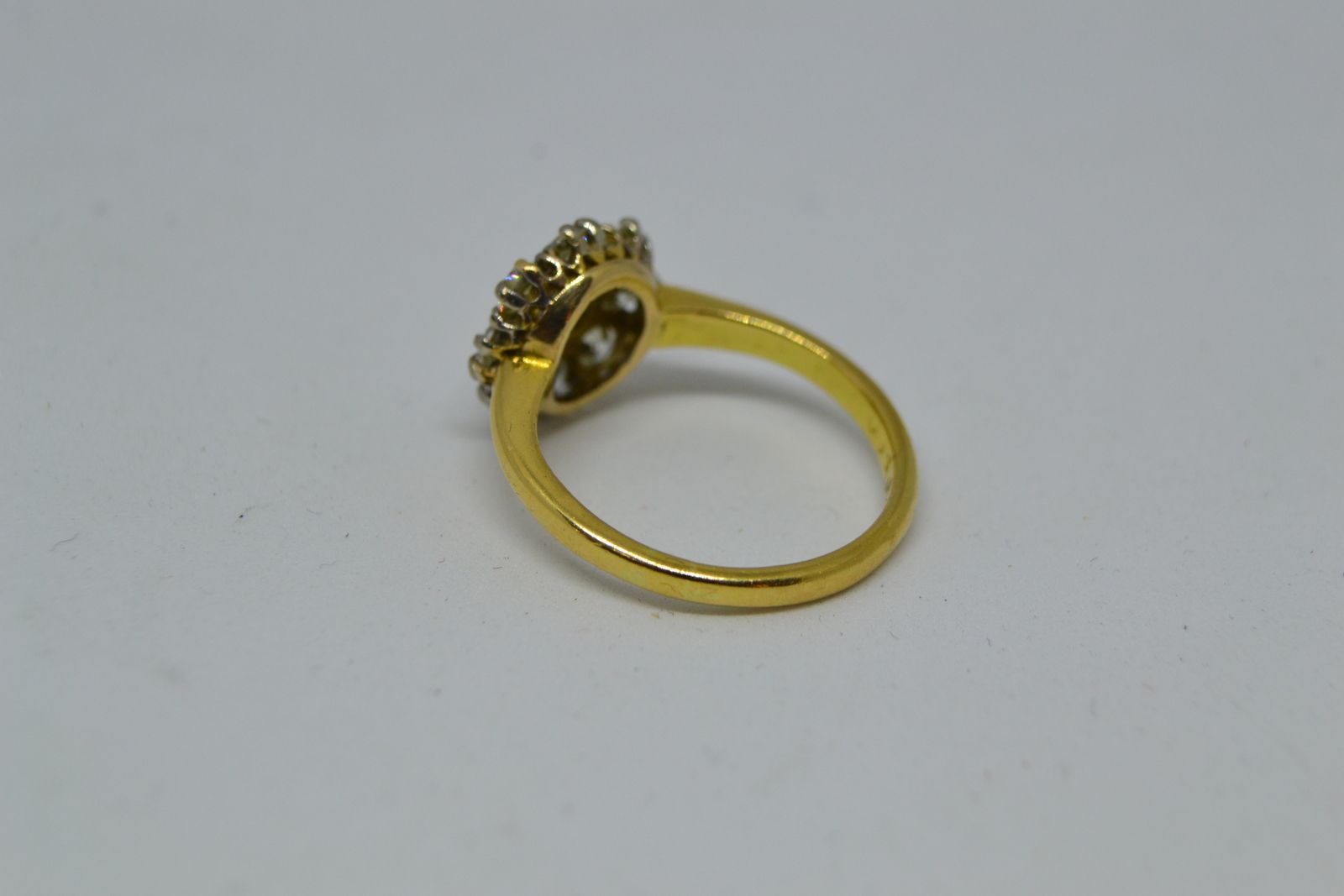 An 18 ct Gold  Diamond Flower Head Cluster Ring