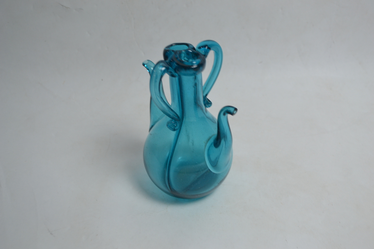 Discover our collection of 19th century Bristol green handblown vinegar bottles. Perfect for antique enthusiasts! Shop now and add a piece of history to your collection.