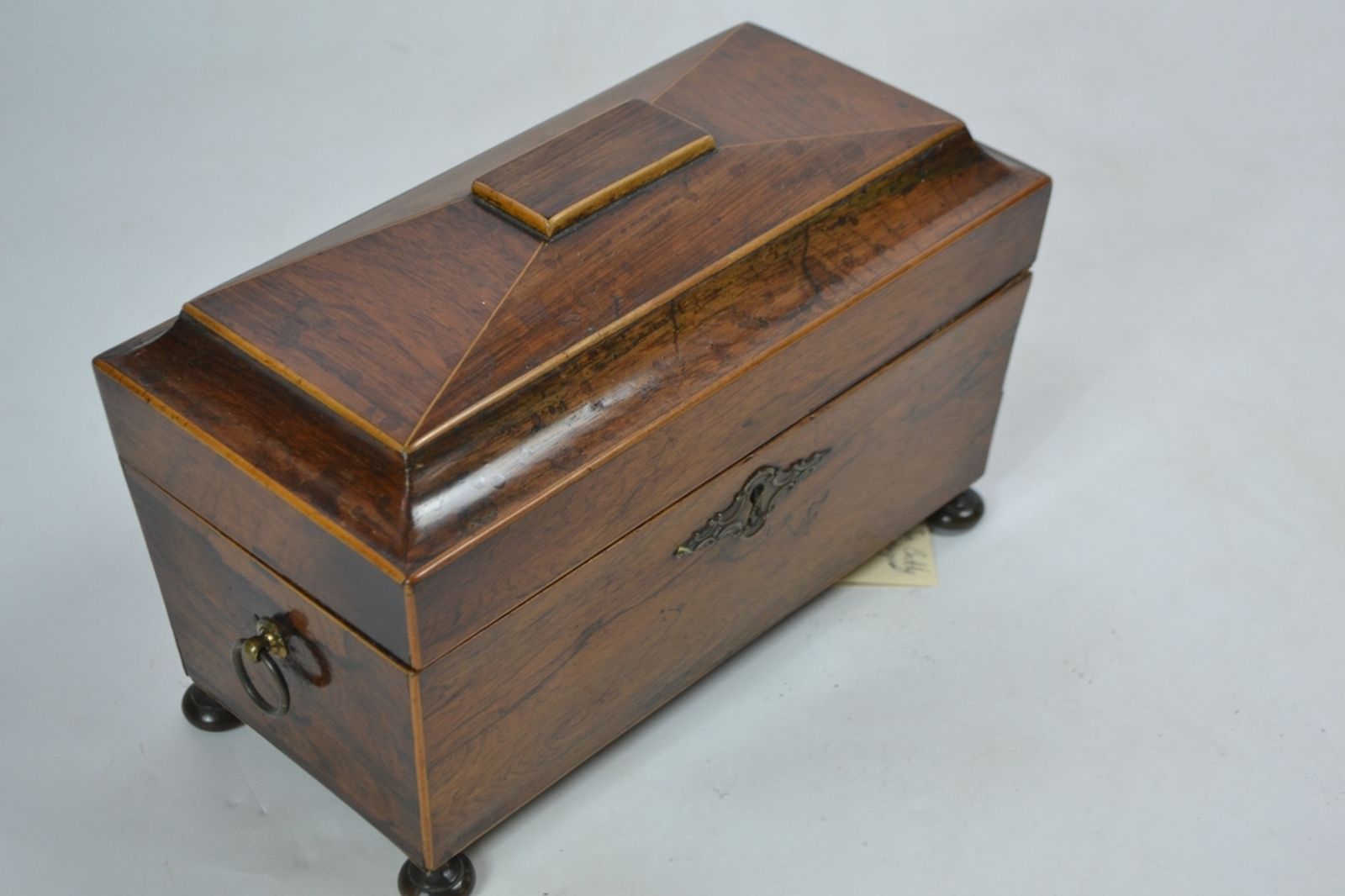 19th century rosewood tea caddy, of sarcophagus form 