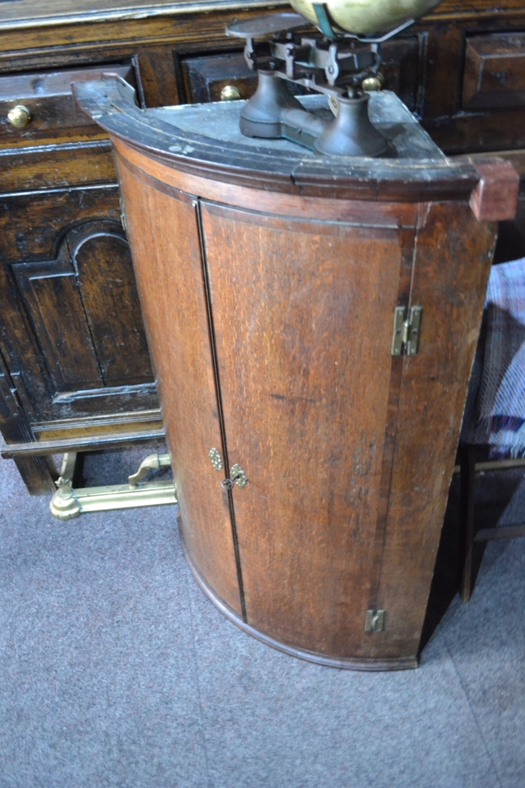 Georgian rounded front mahogany corner cupboard