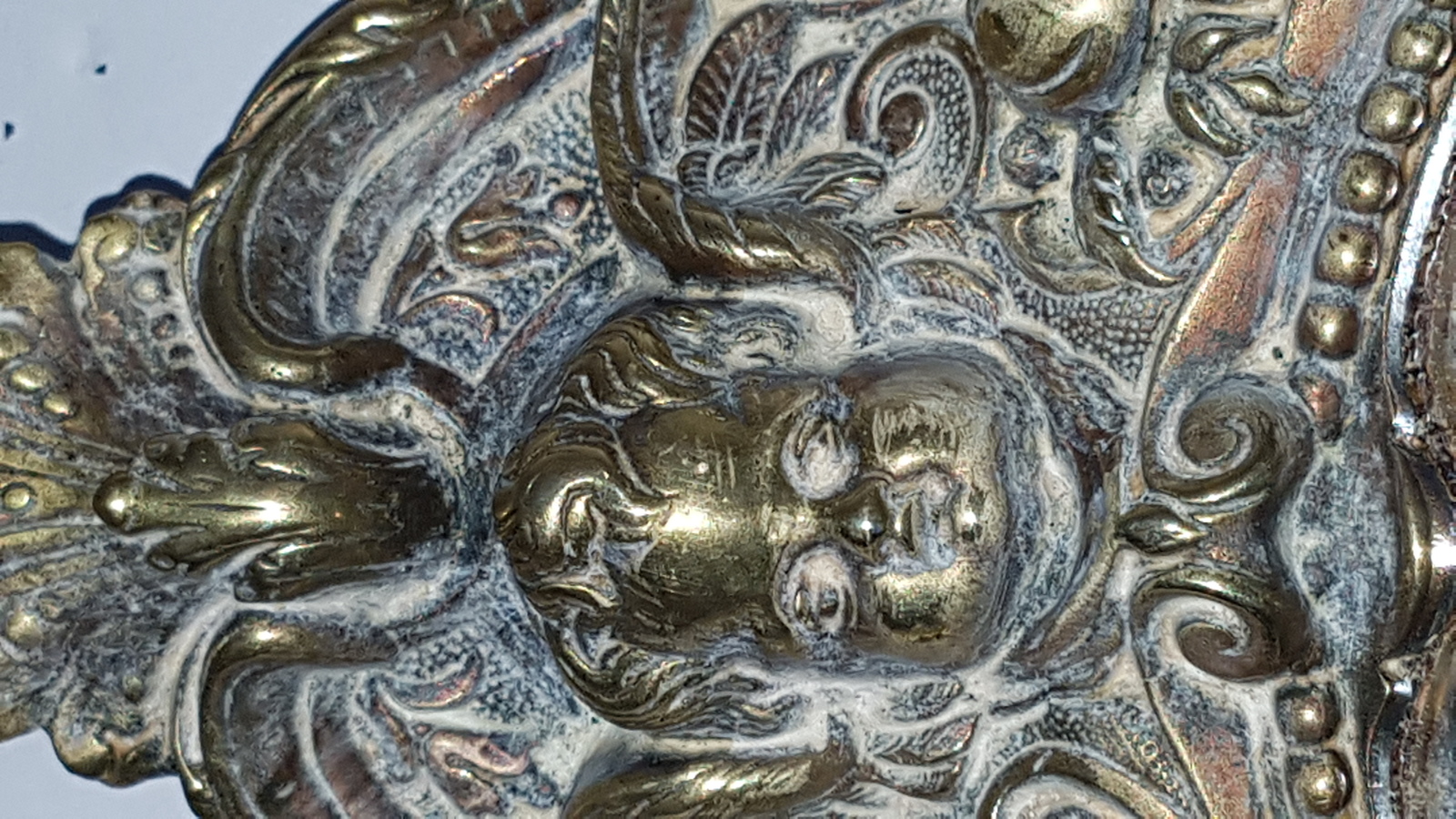 Discover our 19th-century cast brass convex wall mirror, embellished with intricate cherubs, satyr, and floral designs. Shop now for this unique 49cm x 37cm antique decor piece in excellent condition.