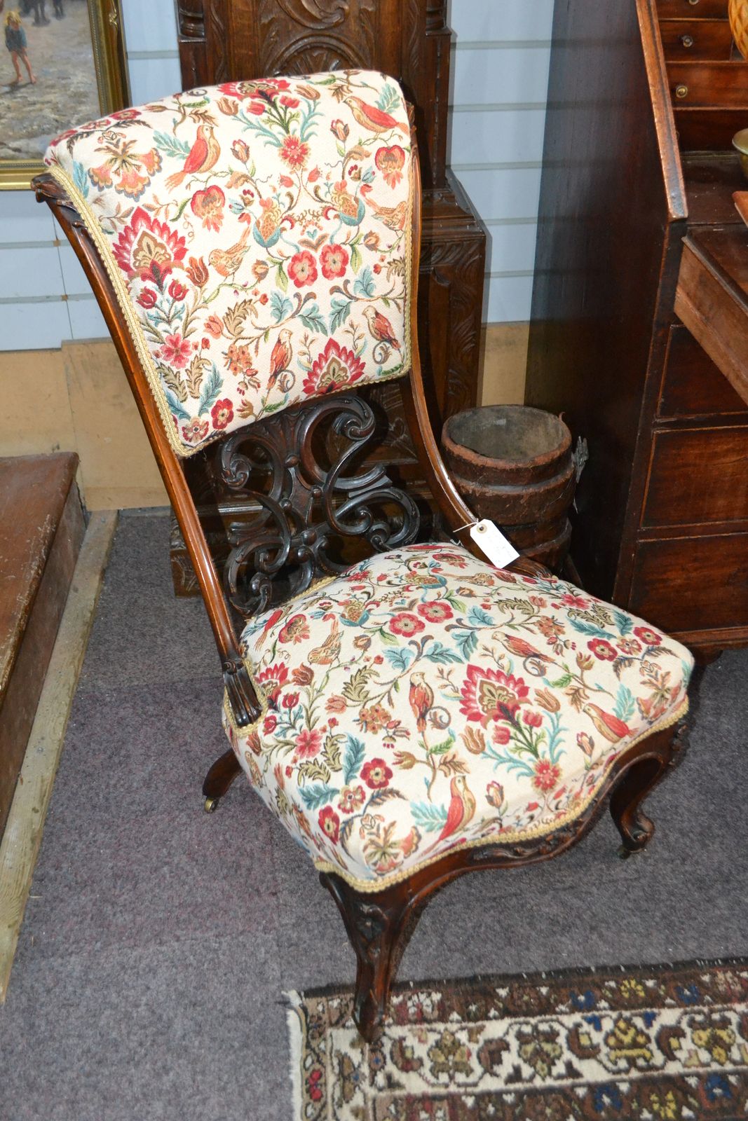 Discover our re-upholstered Victorian mahogany chair with a unique scrolling pierced open back. Shop now for exquisite antique furniture pieces with detailed dimensions!