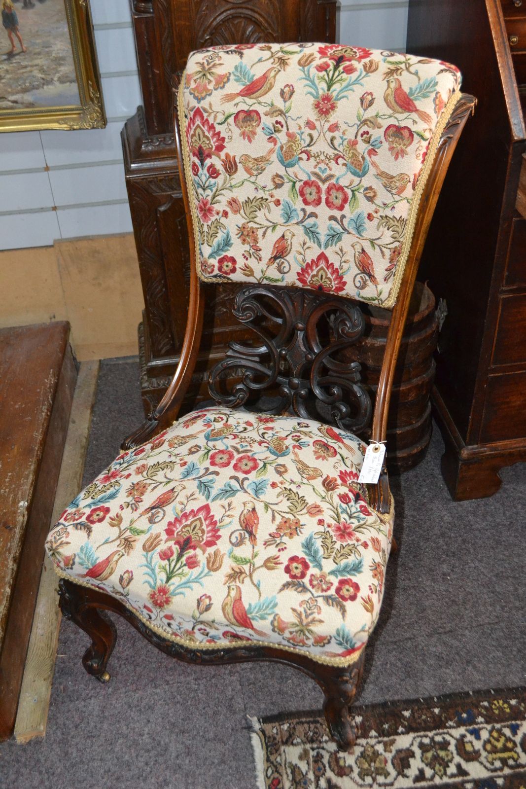 Discover our re-upholstered Victorian mahogany chair with a unique scrolling pierced open back. Shop now for exquisite antique furniture pieces with detailed dimensions!