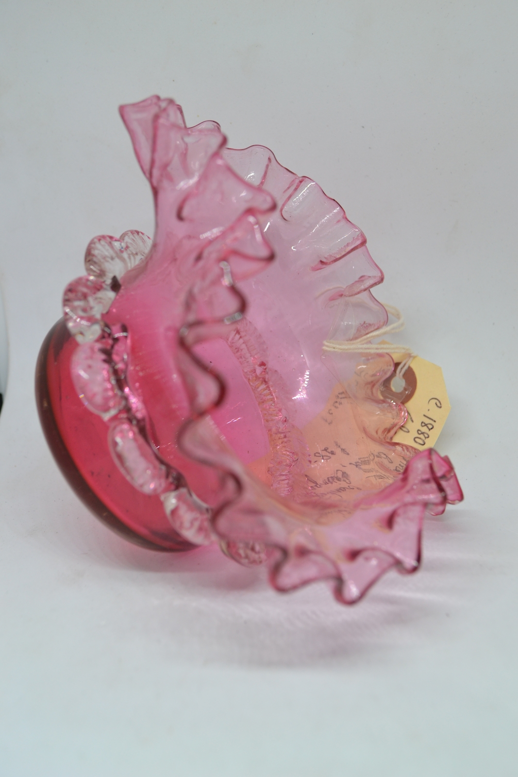 Discover our late 19th century crimped frill glass bowl. Handpicked for its timeless elegance, it promises a vintage charm. Don't miss out, shop now!