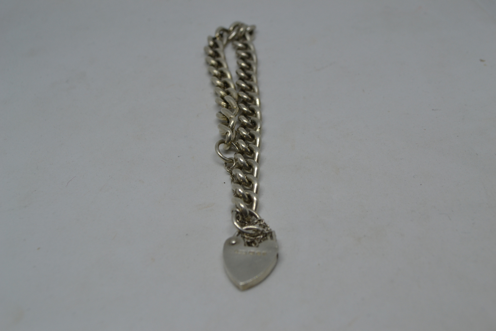 Solid Sterling Silver Curb Link Bracelet With Heart Padlock And Safety Chain.