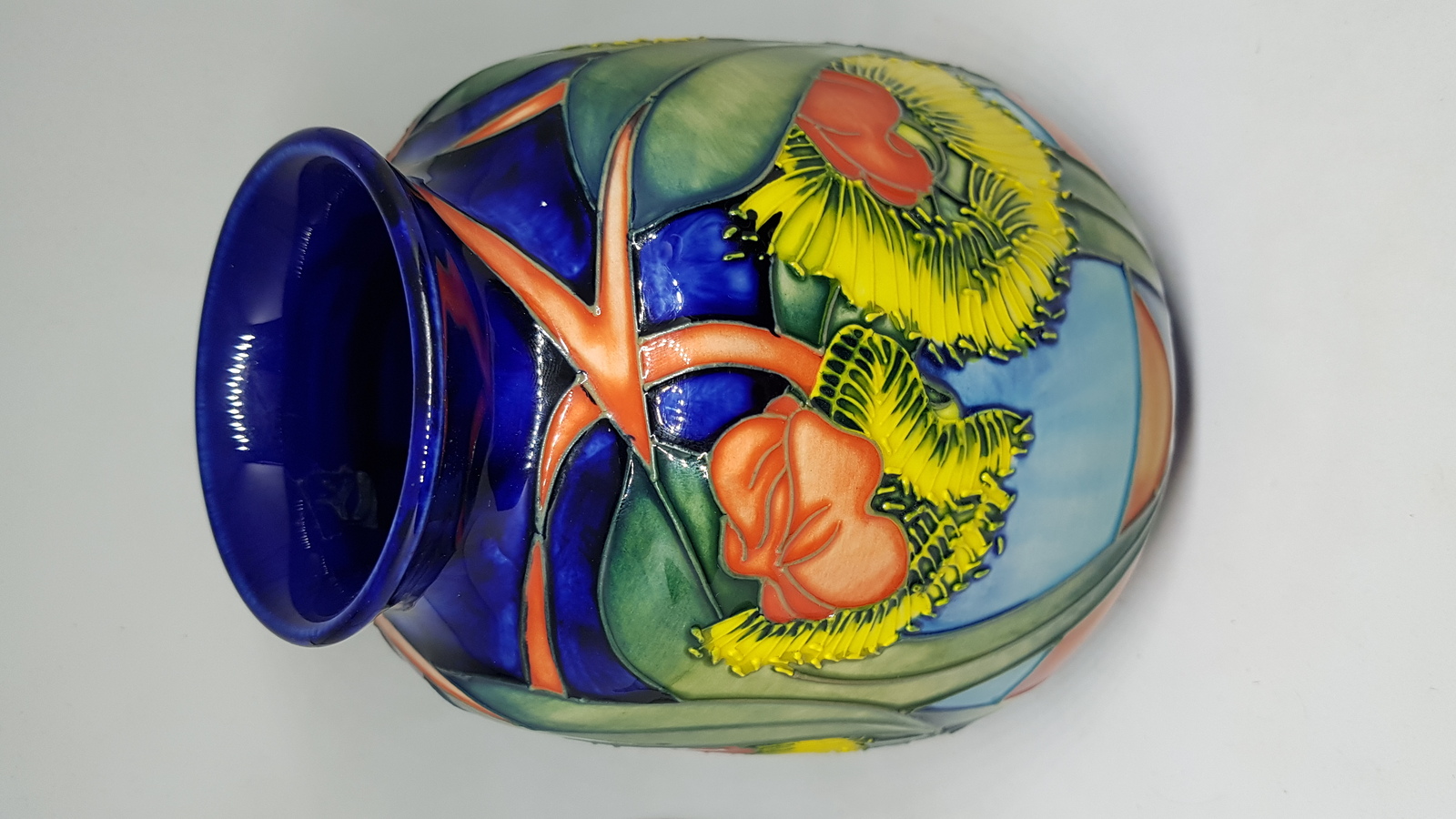 Discover exquisite Moorcroft Vases designed by Emma Bossons. Browse our collection of her vibrant sunflower patterns, created in 2000. Buy now and beautify your home with these unique, high-quality pieces.