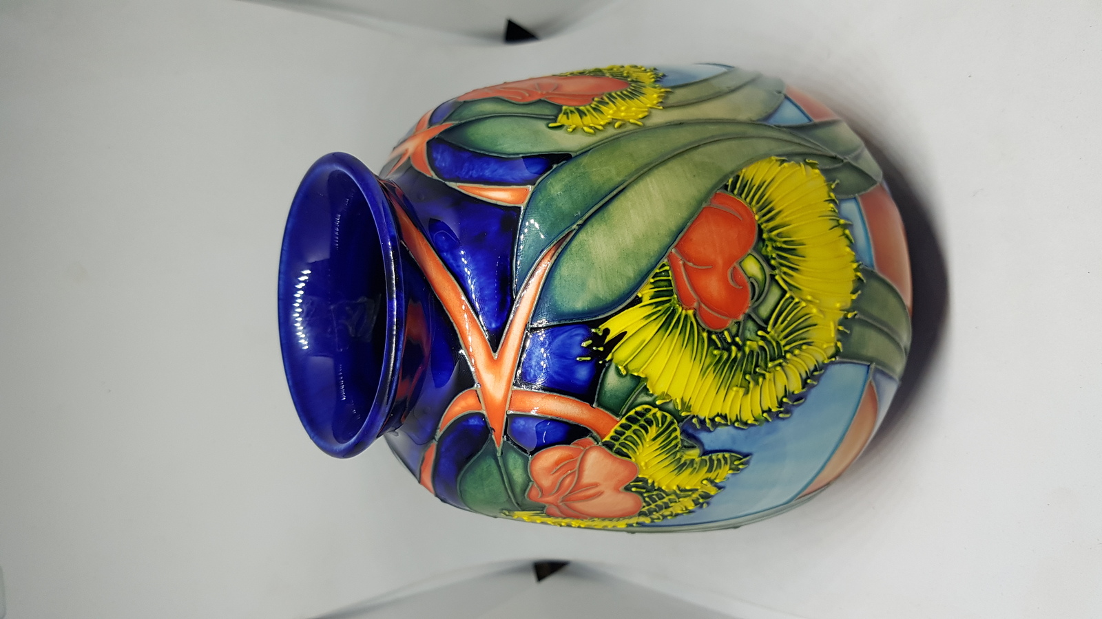 Discover exquisite Moorcroft Vases designed by Emma Bossons. Browse our collection of her vibrant sunflower patterns, created in 2000. Buy now and beautify your home with these unique, high-quality pieces.