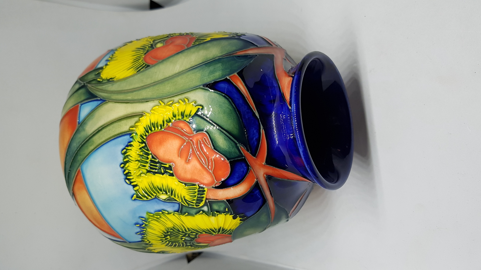 Discover exquisite Moorcroft Vases designed by Emma Bossons. Browse our collection of her vibrant sunflower patterns, created in 2000. Buy now and beautify your home with these unique, high-quality pieces.