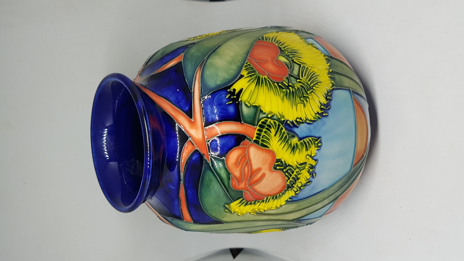 Discover exquisite Moorcroft Vases designed by Emma Bossons. Browse our collection of her vibrant sunflower patterns, created in 2000. Buy now and beautify your home with these unique, high-quality pieces.