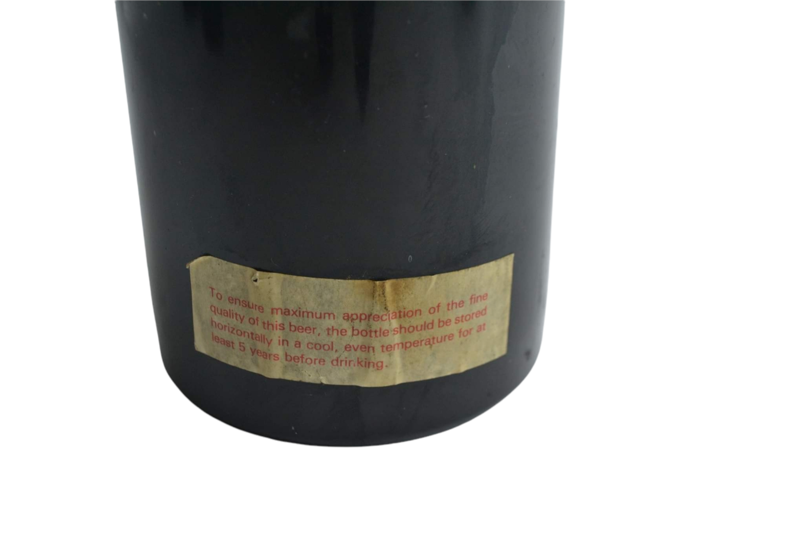 Discover the vintage 1977 Jubilee Strong Ale Quart bottle, unopened and in good condition. Experience a piece of Queen Elizabeth II's Silver Jubilee history. Shop now!