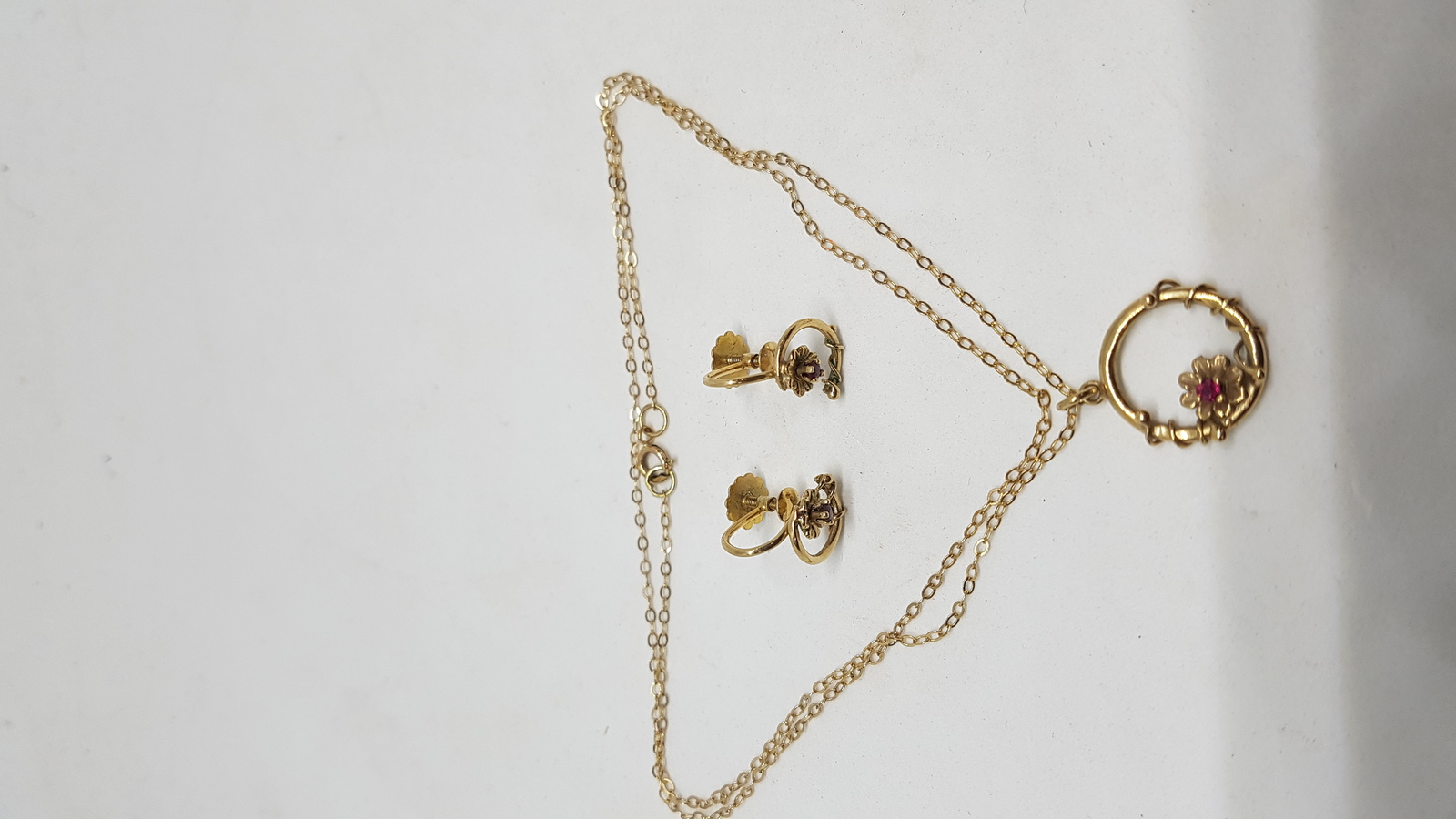 A Set Of 9 ct Gold Chain With Ruby Pendant Matching With  Earrings