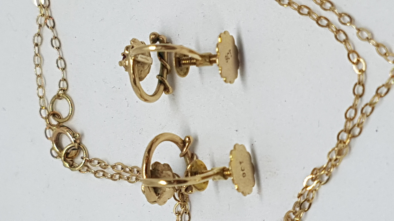 A Set Of 9 ct Gold Chain With Ruby Pendant Matching With  Earrings