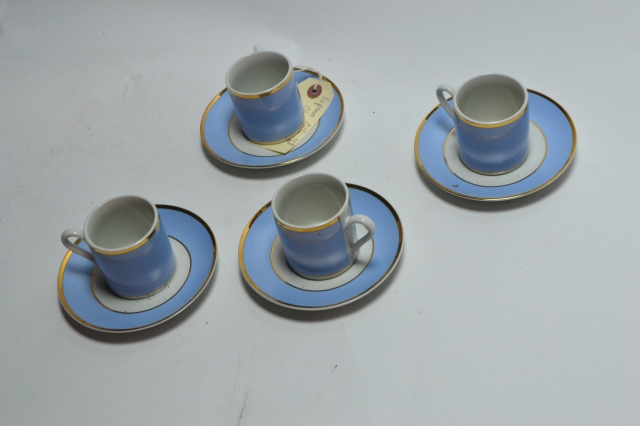 Four Demitasse Coffee Cups and Saucers.