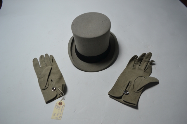 Moss Brothers top hat with a pair of gloves