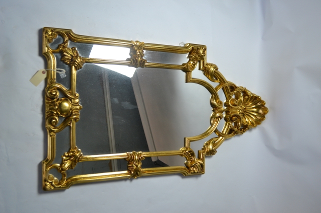 Discover our Regency style gilt wood wall mirror. Perfect size of 113cm x 64cm to brighten any room. Shop now for that elegant touch your home needs.