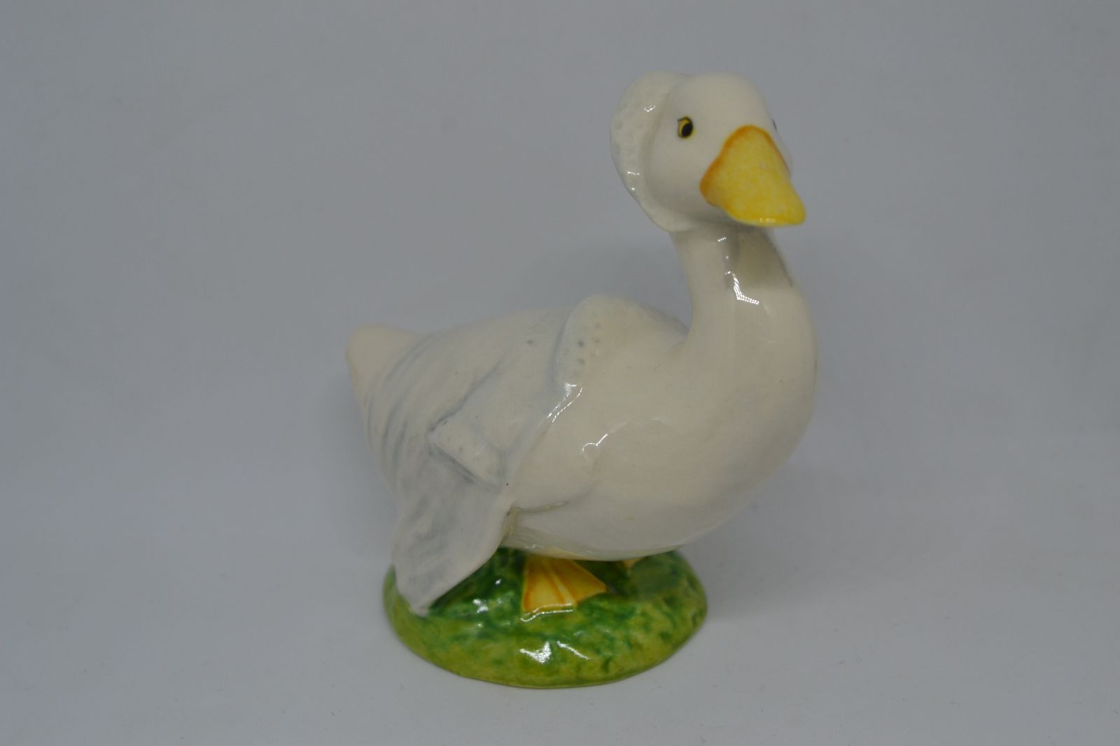 Discover our collection of Beatrix Potter's 'Rebecca Puddle Duck' by Beswick, England. Sized 8.5cm high. Shop now for enduring memories and charm.